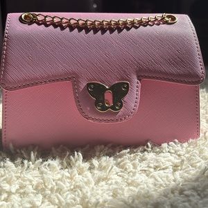 Pink purse with butterfly lock